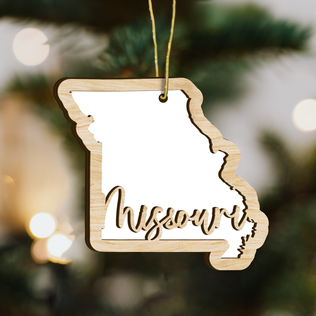 Missouri state-shape wood ornament on a tree, blank photo panel for your own picture