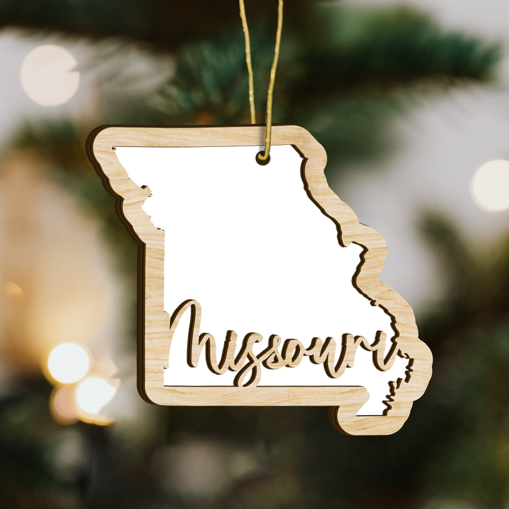 Missouri state-shape wood ornament on a tree, blank photo panel for your own picture