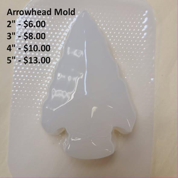 Arrowhead mold, a knapped stone point with notched base and flaked edges, in clear silicone