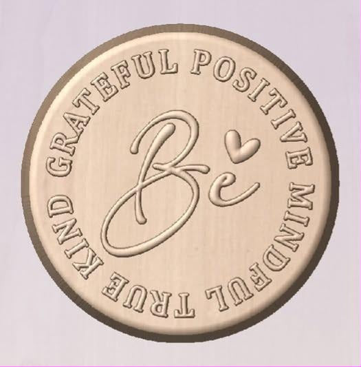 Be grateful affirmation coin mold with Be in script at the centre and five words around the rim