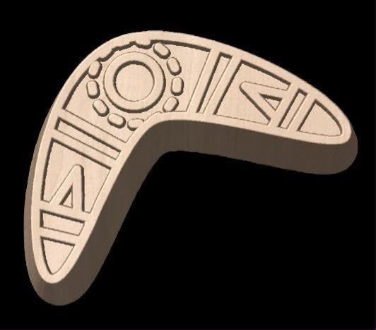 Boomerang mold carved with dot and line patterning along both arms