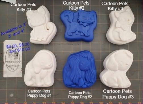 Cartoon pets molds laid out, numbered kitty cats and puppy dogs cast in white and blue