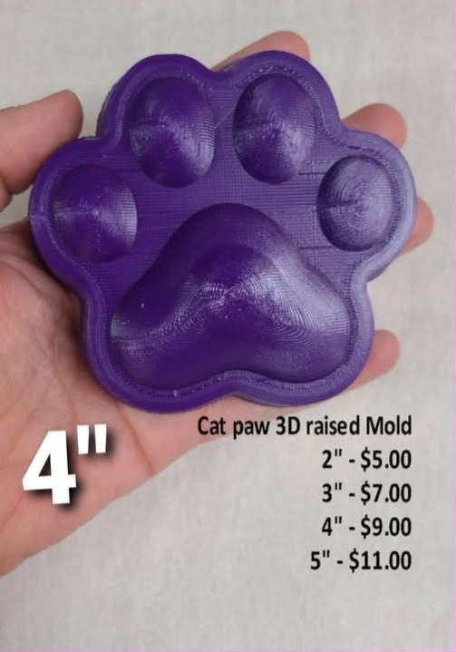 Cat paw mold cast in purple with the pad and four toe beans raised