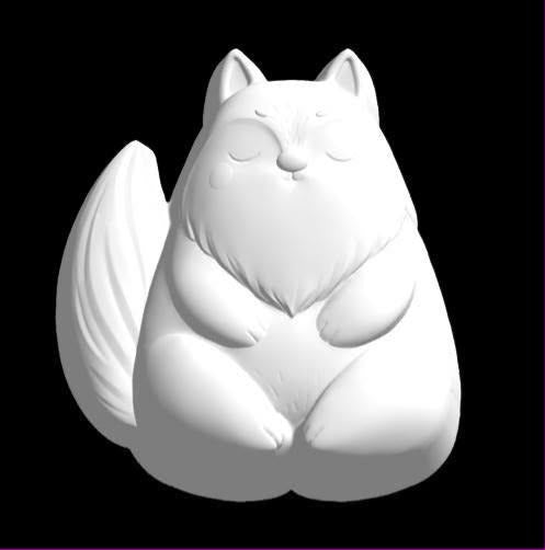 Chubby wolf mold, a round wolf sitting with eyes shut and tail curled beside it