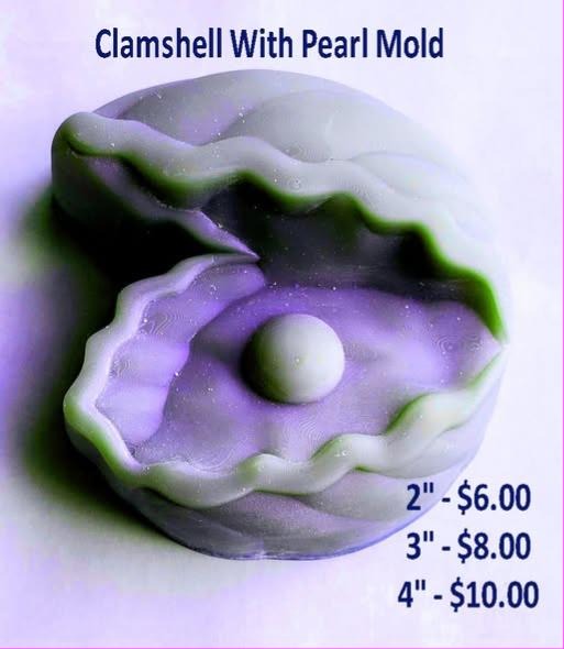Clamshell mold with a pearl sitting in the open shell