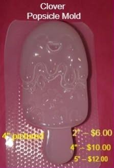 Plastic mold of a rounded popsicle on a stick with a drizzle topping