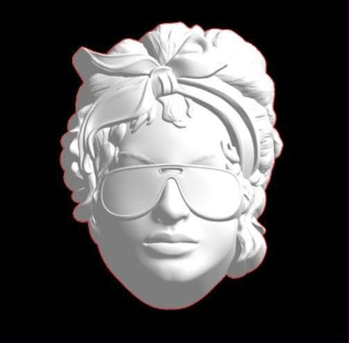 Mold of a woman's face wearing aviator sunglasses and a knotted head scarf