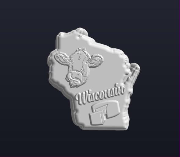 Mold of the Wisconsin state outline with a dairy cow and a wedge of cheese