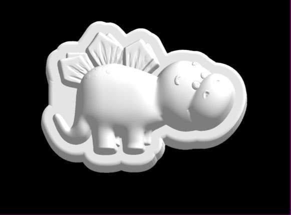 Mold of a round bellied baby stegosaurus with plates down its back and tail