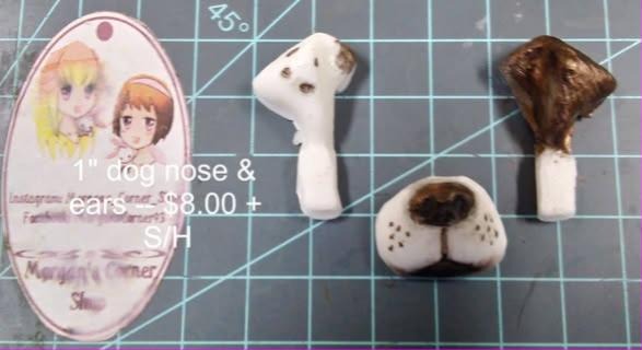 Cast dog and cat noses and ears in white, brown and black