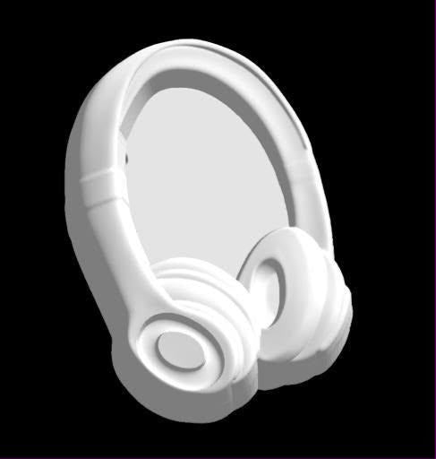 Mold of over ear headphones with a padded headband and round ear cups