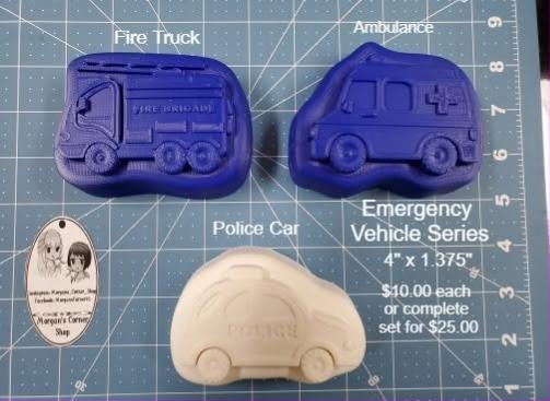 Fire truck, ambulance and police car molds from the Emergency Vehicle Series, cast in blue and cream