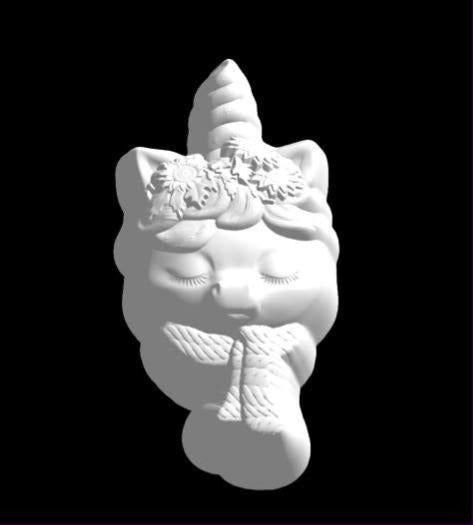 Cast unicorn head mold with closed eyes, spiral horn, sunflower crown and a knotted scarf
