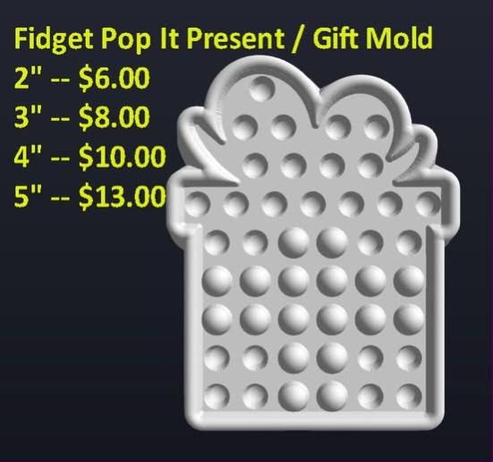 Present mold with a looped bow on top and rows of round push bubbles across the front