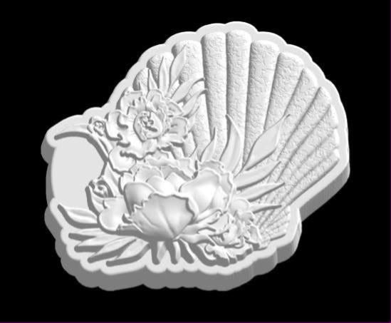 Fan seashell mold with a ribbed shell on the right and a peony, daisy and leaves spilling across the lower left.
