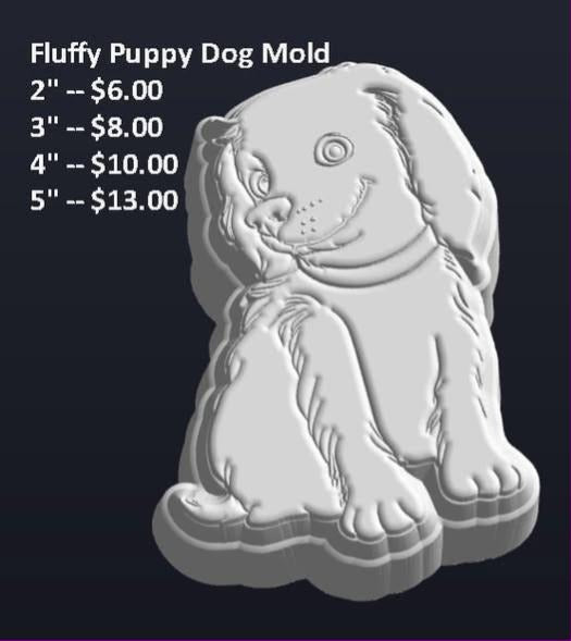 Puppy mold sitting up with long floppy ears, wide round eyes, an open smiling mouth and a plain collar.