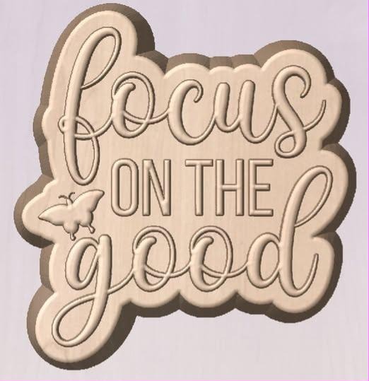 Word plaque mold reading focus on the good in script and block caps, with a small butterfly at lower left.