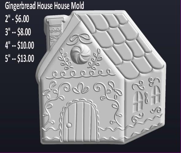 Gingerbread house mold with shingled roof, chimney and piped icing scrolls at door and windows