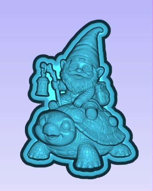 Cast mold of a bearded gnome with a lantern riding on the back of a smiling turtle