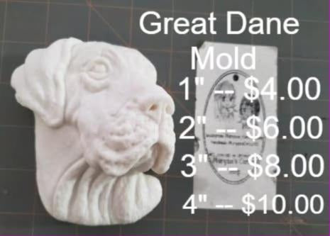 Great Dane head mold with heavy jowls, a wrinkled brow, deep-set eyes and soft folded ears.