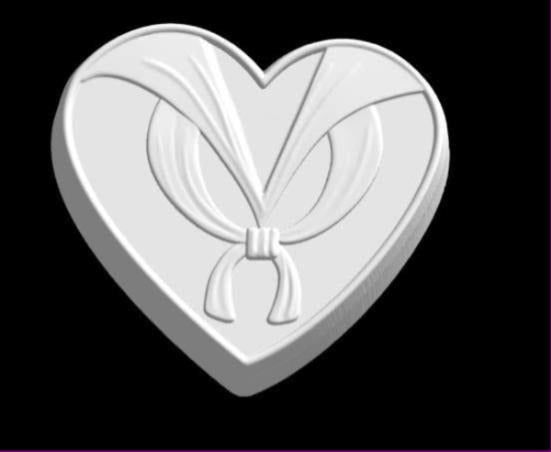 Heart mold cut as a sailor uniform with a wide V collar meeting a knotted neckerchief and two tails.
