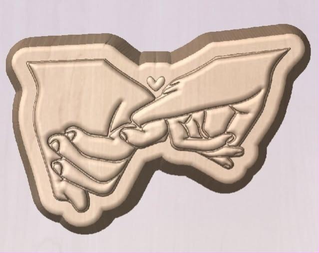 Mold of two hands with pinky fingers hooked together and a small heart above the join.