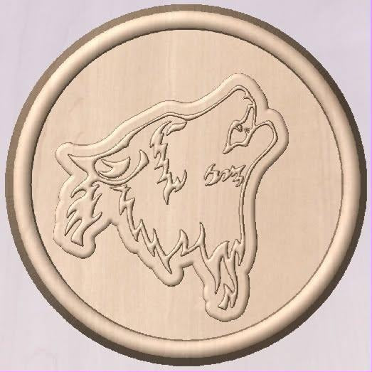 Round disc mold with a wolf's head thrown back mid-howl, cut in fine engraved line work.