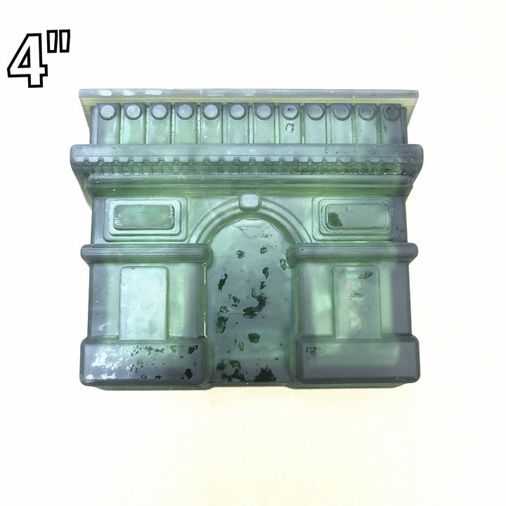 Green resin Paris arch cast at four inches, side panels and dentil cornice catching the light.