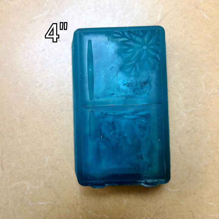 Blue two-door refrigerator cast at four inches, bar handles and a snowflake on the door.