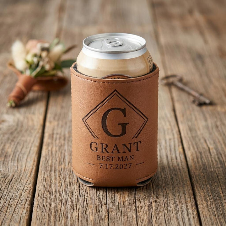 Single tan leatherette can cooler engraved G, GRANT, BEST MAN and the date, holding a can.