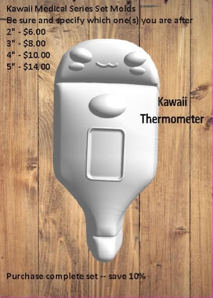 Kawaii thermometer mold with a small smiling face at the top and a rectangular readout panel