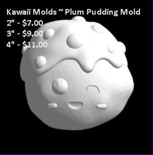 White casting of a domed plum pudding with dripping sauce, round berries and a small kawaii face
