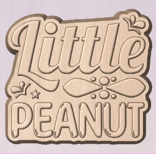 Word plaque mold reading Little in retro script over PEANUT in tall capitals with a leaf and dot flourish.