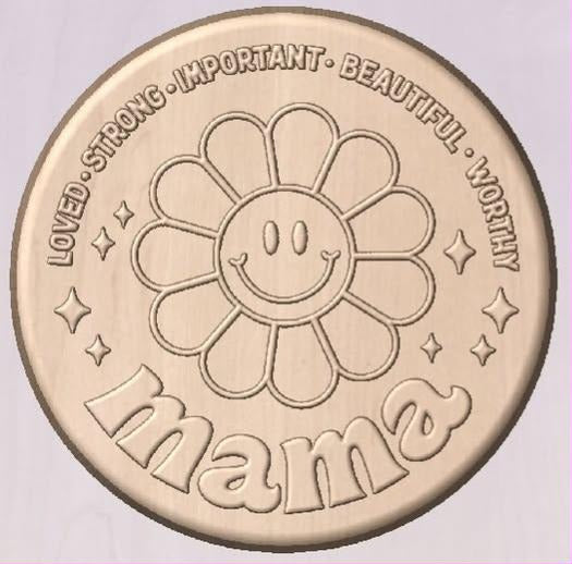 Round coin mold with loved strong important beautiful worthy around the rim, a smiling daisy and mama below.