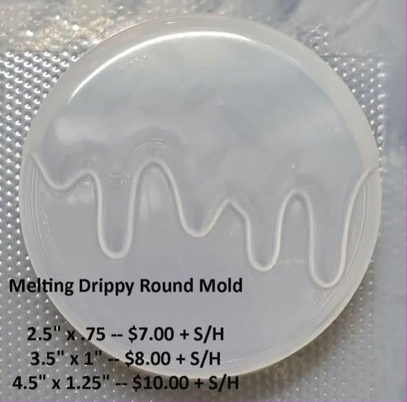 Clear round plastic mold with a wavy melting drip line running across the face of the disc