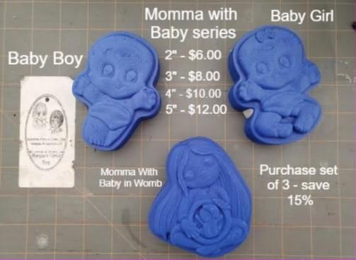 Cast mold of a chubby seated baby boy with a hair curl and one arm raised in a wave