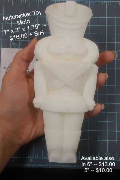 One-part nutcracker soldier mold with tall shako hat, moustache, crossed straps and boots