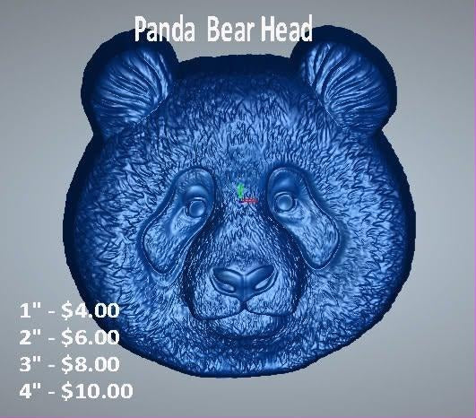 Cast mold of a panda bear's head with rounded ears, patched eyes and a broad furry muzzle
