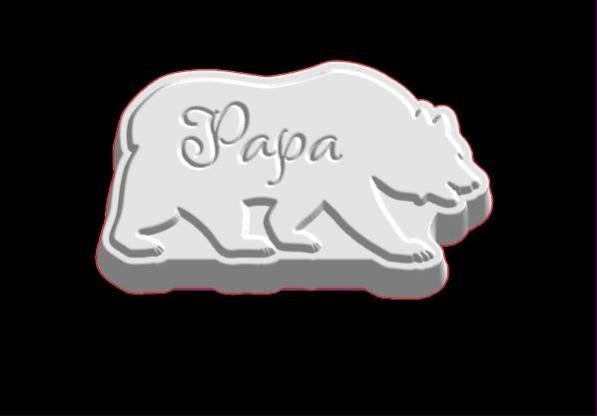 Bear mold, a bear walking in profile with Papa written across its flank in flowing script.