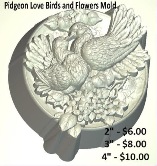 Round mold with two doves nestled together, one wing fanned open, among leaves and blossoms.
