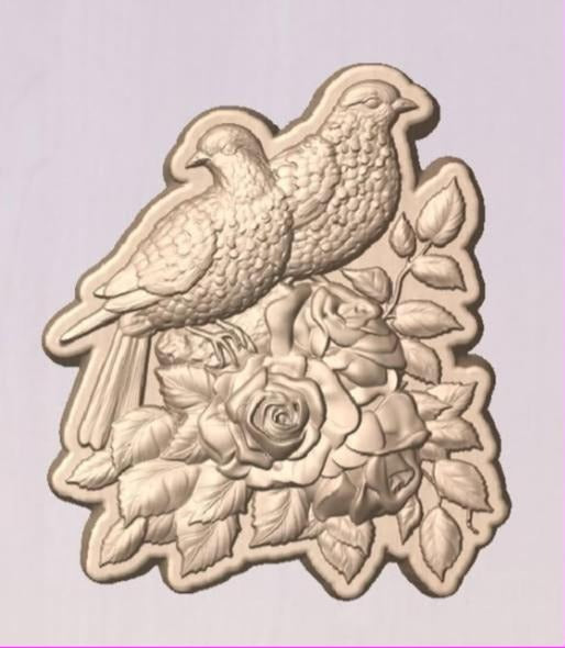 Shaped plaque mold: two pigeons perched on a branch above a spray of open roses and leaves.