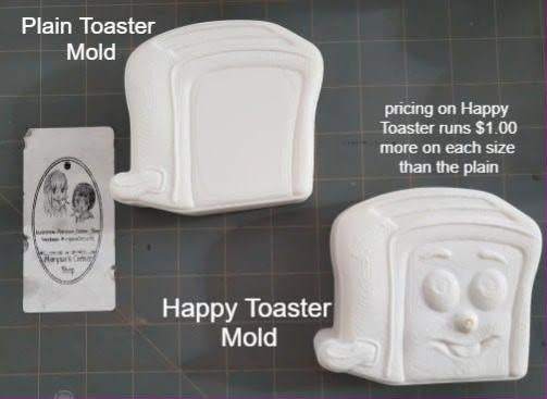 Cast toaster mold with a bread slot, side lever and a plain blank recessed front panel