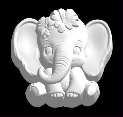 Cast mold of a seated baby elephant with fanned ears and a cluster of flowers on its head