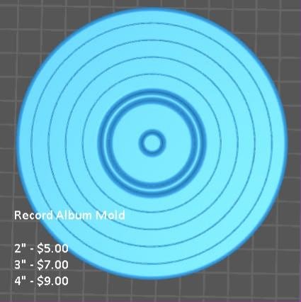 Vinyl record mold with concentric grooves, raised centre label ring and spindle hole