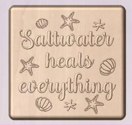 Tan square plaque casting reading Saltwater heals everything with shells and starfish around the words