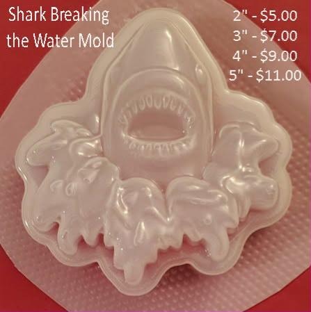 Clear plastic mold of a shark breaching with open jaws and curling splash around its head