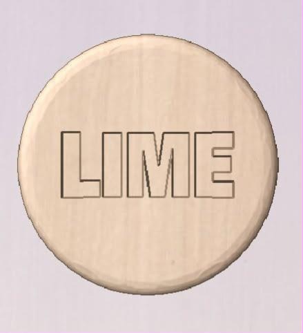 Round shower tablet mold with LIME in wide outlined block capitals across the face.