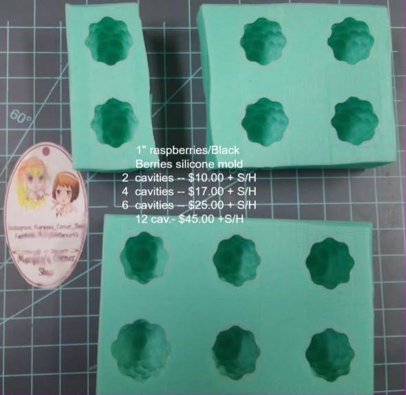 Green silicone berry molds with domed raspberry and blackberry cavities in three blocks