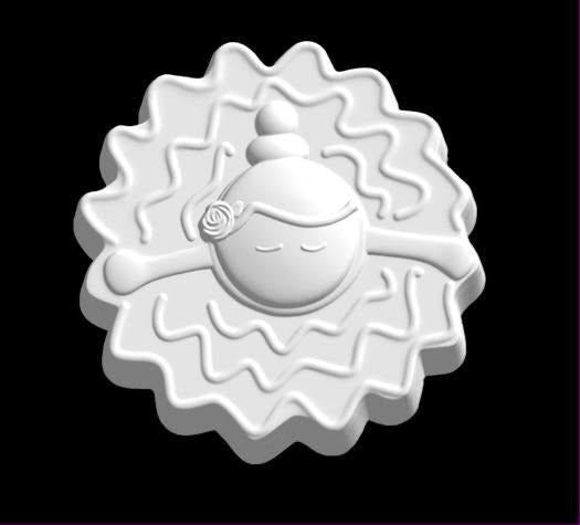 Ballerina mold seen from above with a topknot bun and a ruffled tutu fanning into a scalloped skirt.