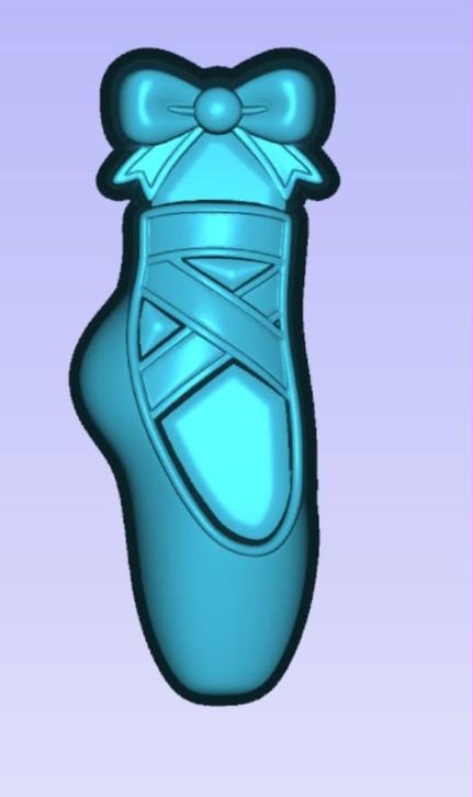 Pointe shoe mold standing upright with crossed ankle ribbons and a large looped bow on top.